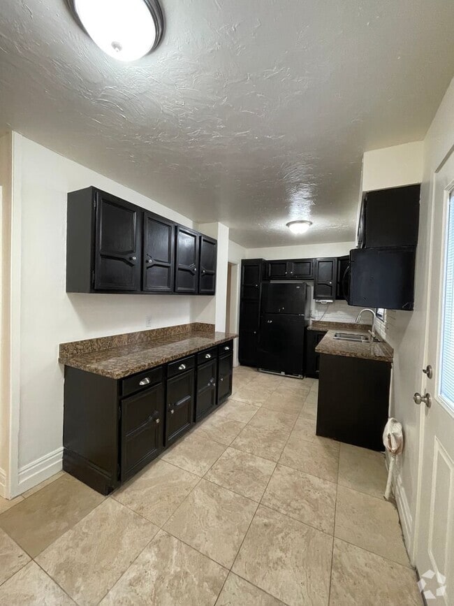 Building Photo - 7636 Steffensen Dr Unit Upstairs Rental
