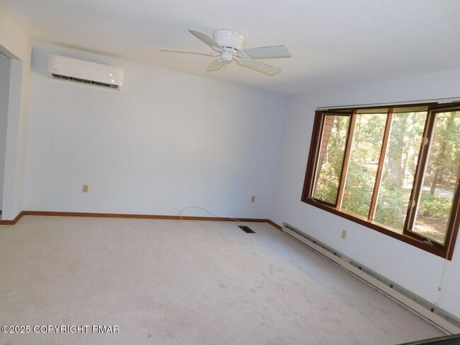 Photo - 3-bedroom, 2-bath home featuring an open f...