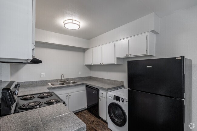 2 BR, 1 BA - 720 SF - Kitchen with Washer and Dryer