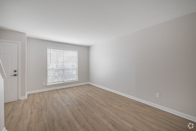 2BR, 1.5BA - 1,100SF - Living Room - Oakleaf Townhomes