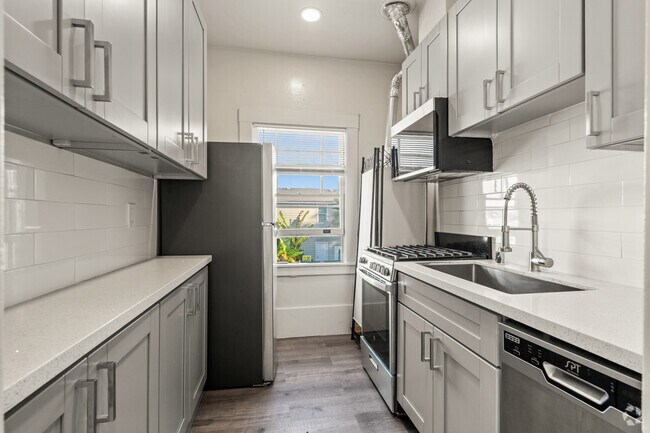 1BR, 1BA - 500SF - Kitchen - 4030-4038 Martin Luther King Jr Way Apartments