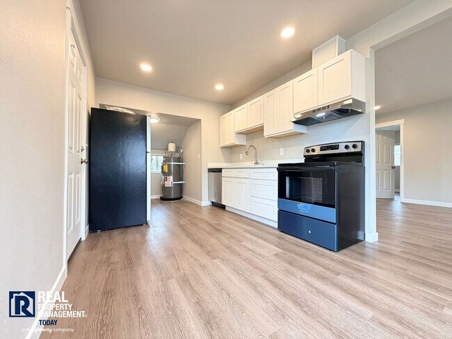 Photo - MOVE-IN SPECIAL! Completely Renovated 2 Bedroom Home Near PLU | New Kitchen & Stainless Appliances