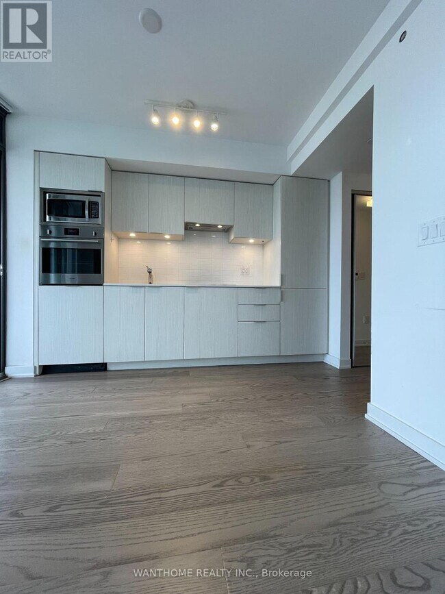 Photo - 11 Wellesley St W Unité 2412