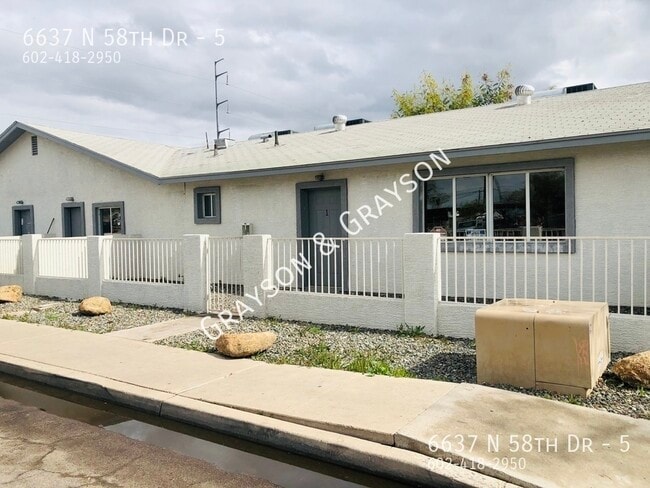 Building Photo - 6637 N 58th Dr Unit 5