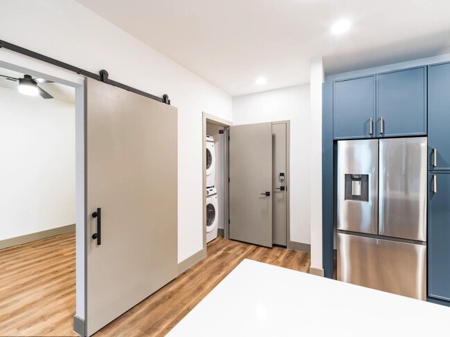 A smart layout with in-home laundry, sleek storage, and easy access throughout. - Modera Chandler