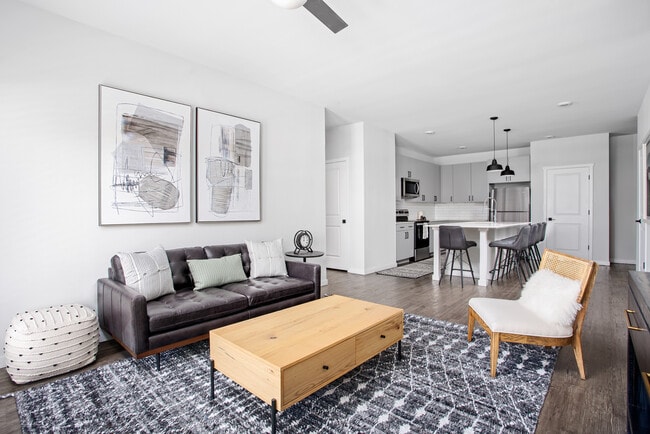 Spacious living rooms designed for comfort and style. - Grant Row Lofts