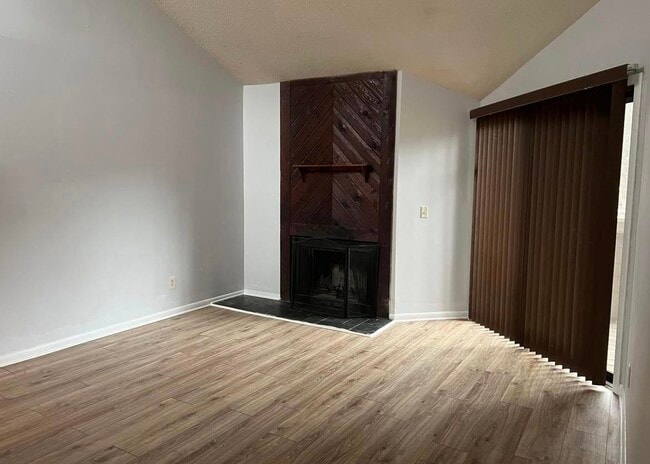 Living Room (with fireplace) - 4517 Sharon Chase Dr Unit F