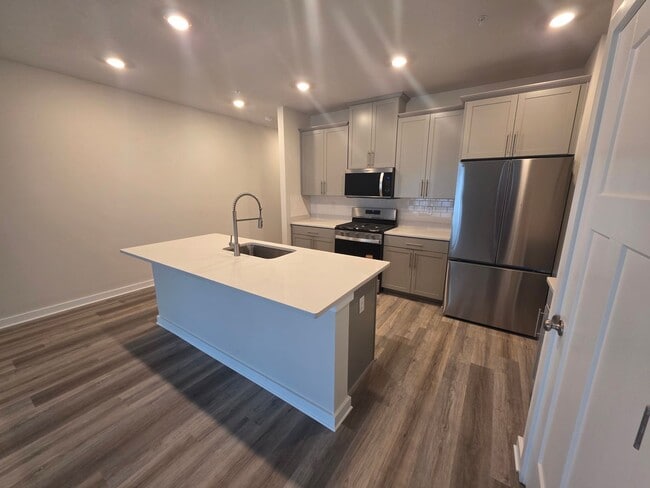 Photo - Luxury 4-Bedroom Townhome with Finished Walkout Basement & River Views