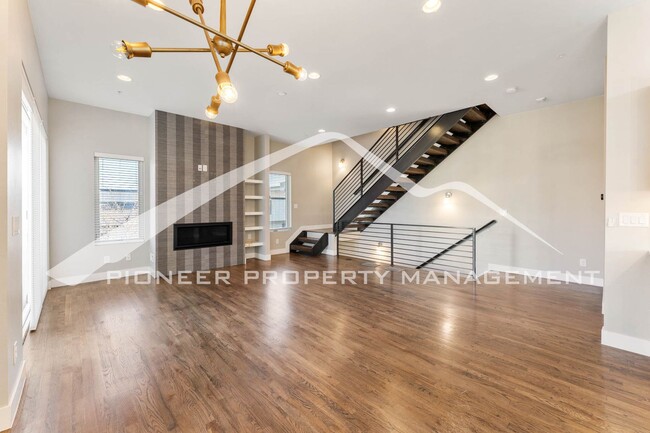 Photo - Fantastic Townhome with A Roof Top Patio, Attached Garage, and Central AC!