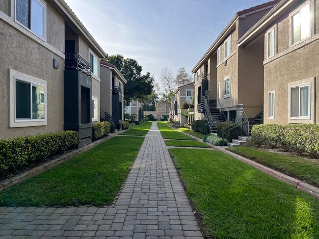 Building Photo - 7545 Charmant Dr Unit 1327