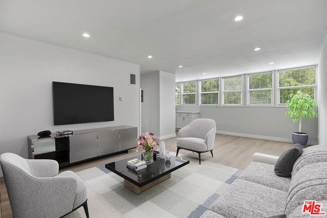 Building Photo - 144 N Swall Dr Unit E Rental