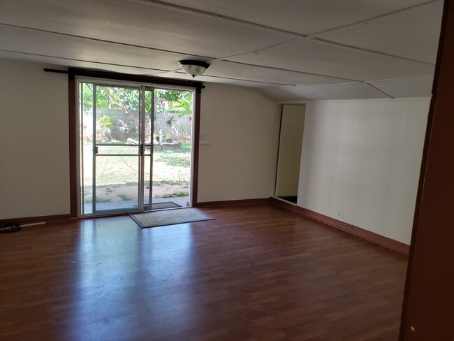 Living Room facing yard - 129 Ulupa St