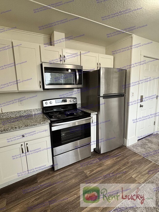 Photo - Singh Tacoma 4-Plex Unit 4