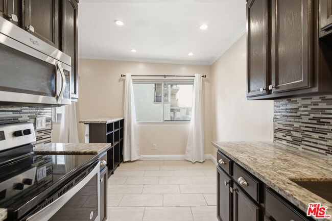 Photo - 8710 Belford Ave Unit 207B
