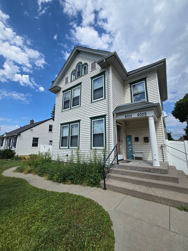 Building Photo - 6031 Portland Ave S Unit 1