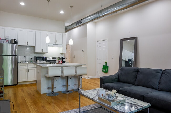 Apt 2 (3bd/2ba) - Open Living Room / Kitchen - Harris Point Chicago