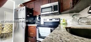 Building Photo - 9920 NW 68th Pl Unit 203