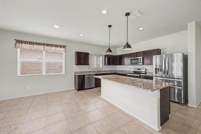 18363 W Whispering Wind Dr