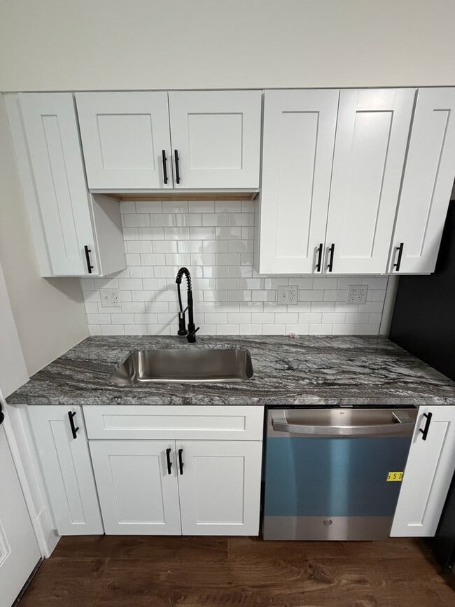 Photo - Rare 2-Full Bath Find: Pristine Renovation with Designer En-Suite & Granite