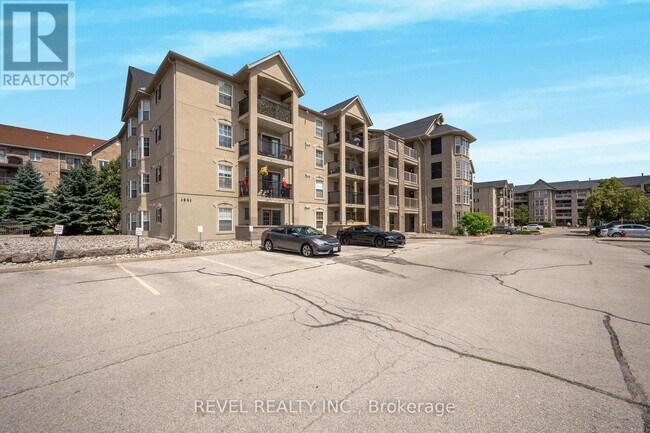 Photo - 1441 Walkers Line Unit 105