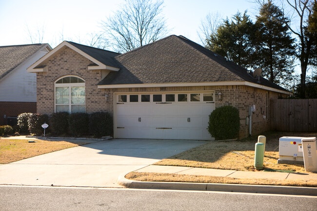 house front with two car garage - 307 Dovington Dr