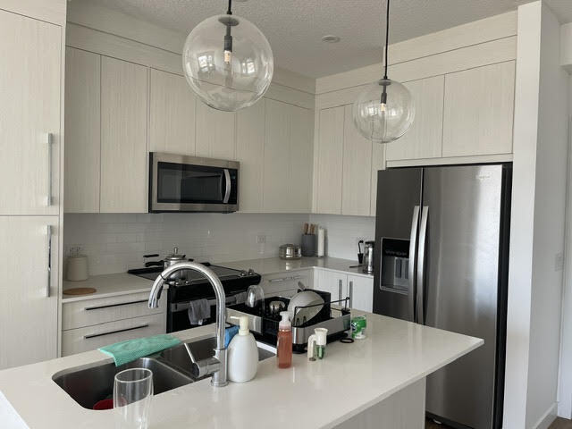 Building Photo - Modern 2 Bedroom + Den Condo with Underground Parking in Skyview Ranch (IP054) Unit 2402