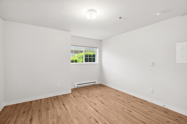 Bright, open bedroom with natural light.