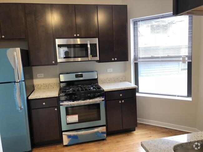 Building Photo - 4821 N Christiana Ave Unit 1W Rental