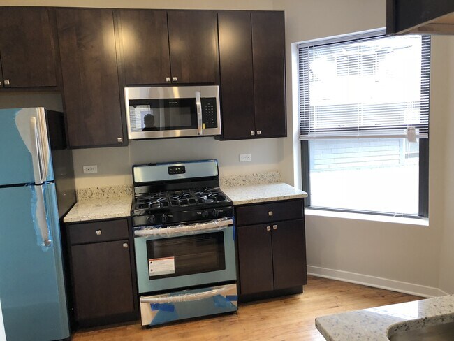 Photo - 4821 N Christiana Ave Apartments Unit 1W