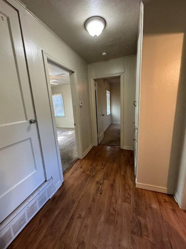 Photo - Mowing Included!  Lots of character, wood vinyl flooring and carpet, large, fenced yard, ready fo...