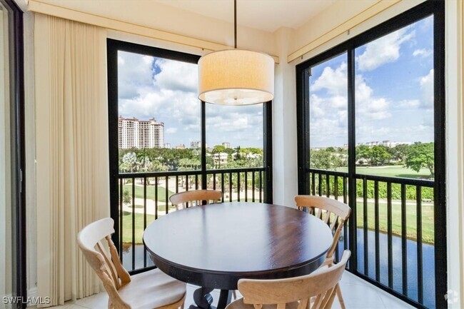 Building Photo - 7040 Pelican Bay Blvd Unit D405 Rental