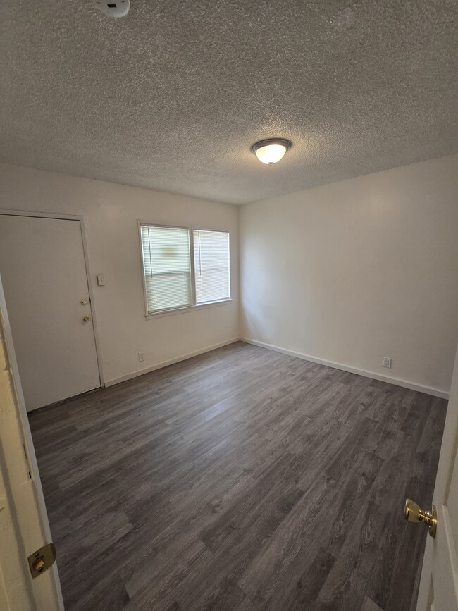 Bedroom - 10212 S Main St Apartments