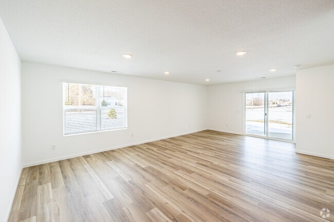 3BR, 2BA - 1,498SF - Unit B - Living Room - Thunderhawk Villas