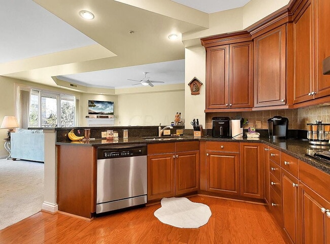 Building Photo - "Spacious 2-Bedroom Condo with Elegant Har... Unit 106