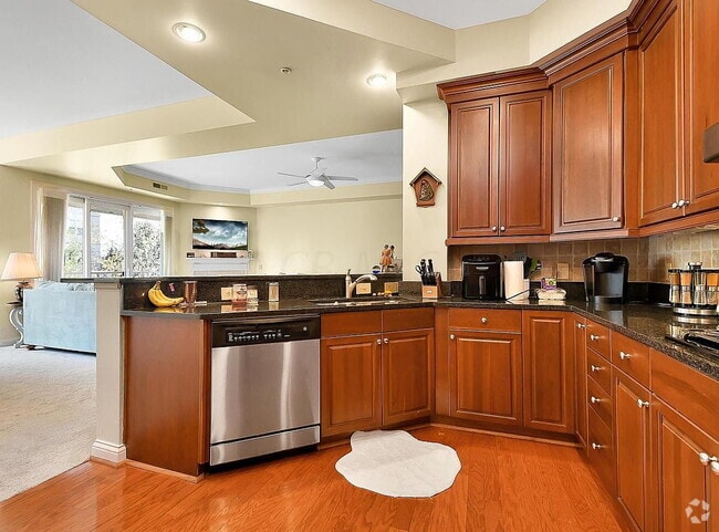 Building Photo - "Spacious 2-Bedroom Condo with Elegant Har... Unit 106