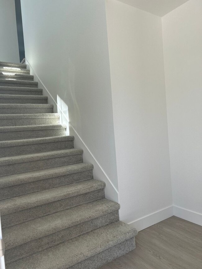 Photo - The Vineyards at Dennis Lane Studio unit with back yard and garage