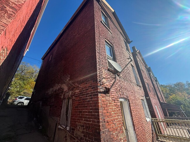 Photo - Updated flooring, finished basement, and g...