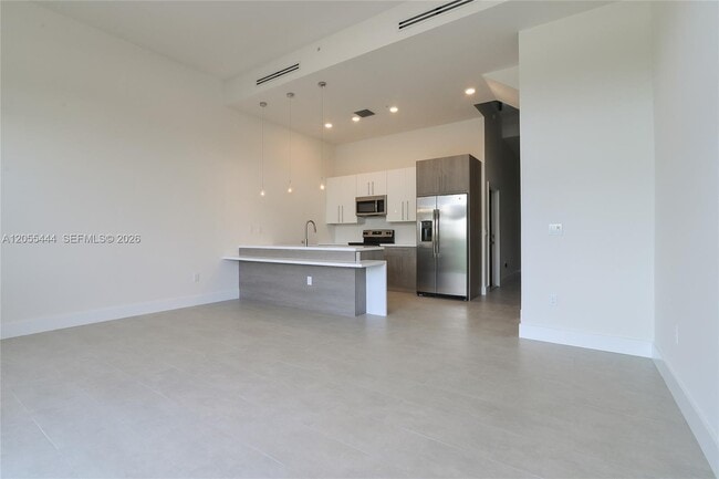 4413 NW 9th St.