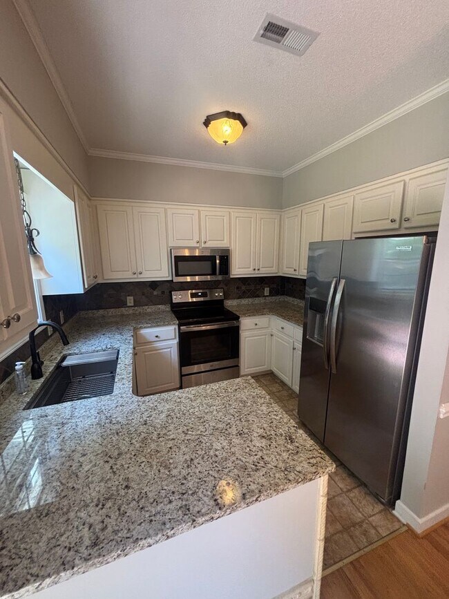 Photo - Beautifully Maintained Townhome In The Heart Of Town!