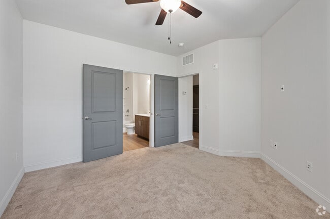 2BR, 2BA - 1,065SF- Primary Bedroom