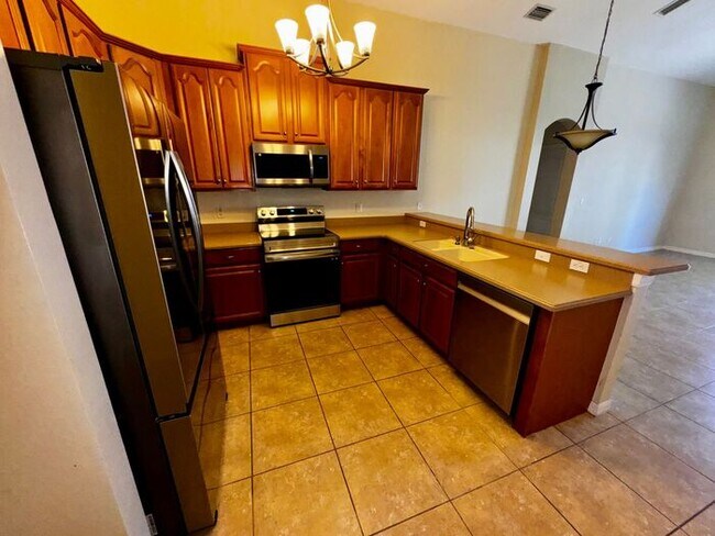 Photo - Timber Isle 4 bedroom home 2 bath home on a corner lot with New Kitchen Appliances!