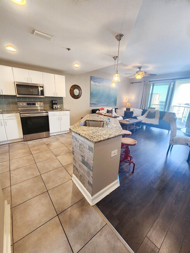Photo - 11832 Front Beach Rd Unidad SI FL2-ID1468542P