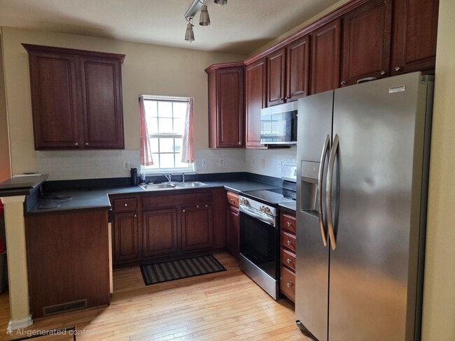 Photo - 3BD/3.5BA Townhouse in Town Center! with Garage and Patio- First Floor Primary Suite