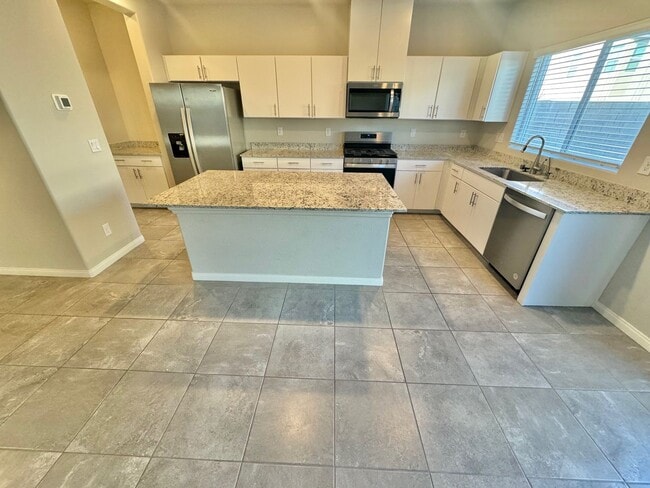 Photo - Gorgeous two-story home with 5 bedrooms and 3 bathrooms in a gated community