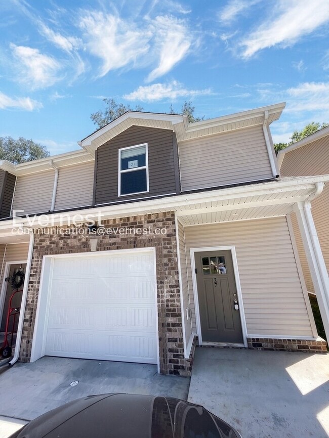 Building Photo - Limited Time Special Offer / Spacious Townhome with Modern Amenities / 2 Beds 2.5 Baths / Availab...