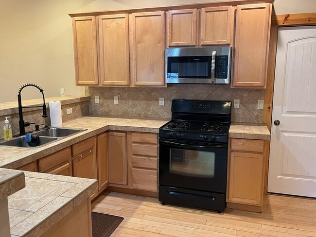 Photo - Charming 3 Bed + Loft Row Home in Quiet Neighborhood | 2.5 Baths | 2-Car Garage