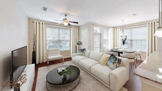 Open Floor Plan Living and Dining Room - Heritage Grand at Sienna Apartments