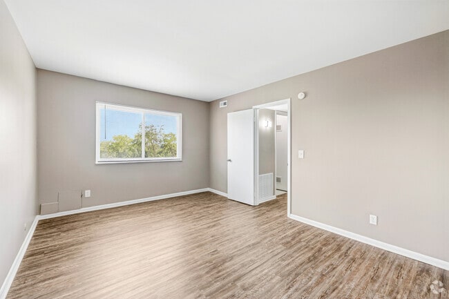1BR, 1BA - 896SF - Primary Bedroom - Chimney Hill Apartments