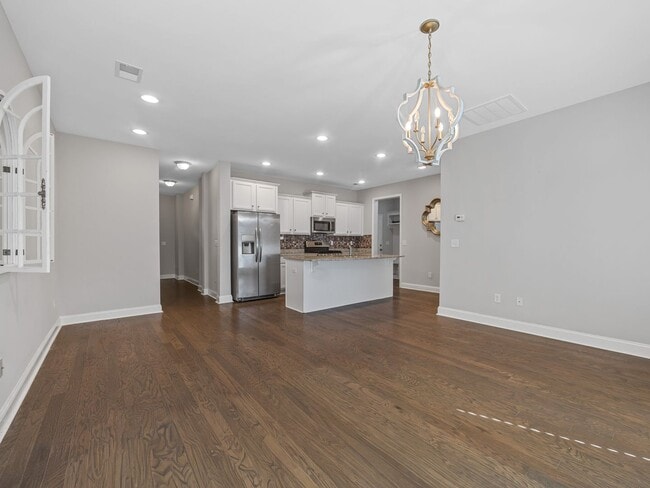 Building Photo - Spacious 4BR Townhouse with 2-Car Garage N...