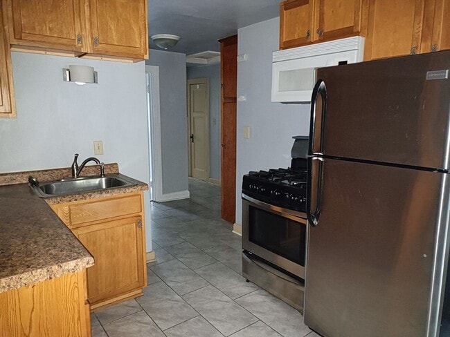 Building Photo - 2254 N 67th St Unit 2254a upper Rental
